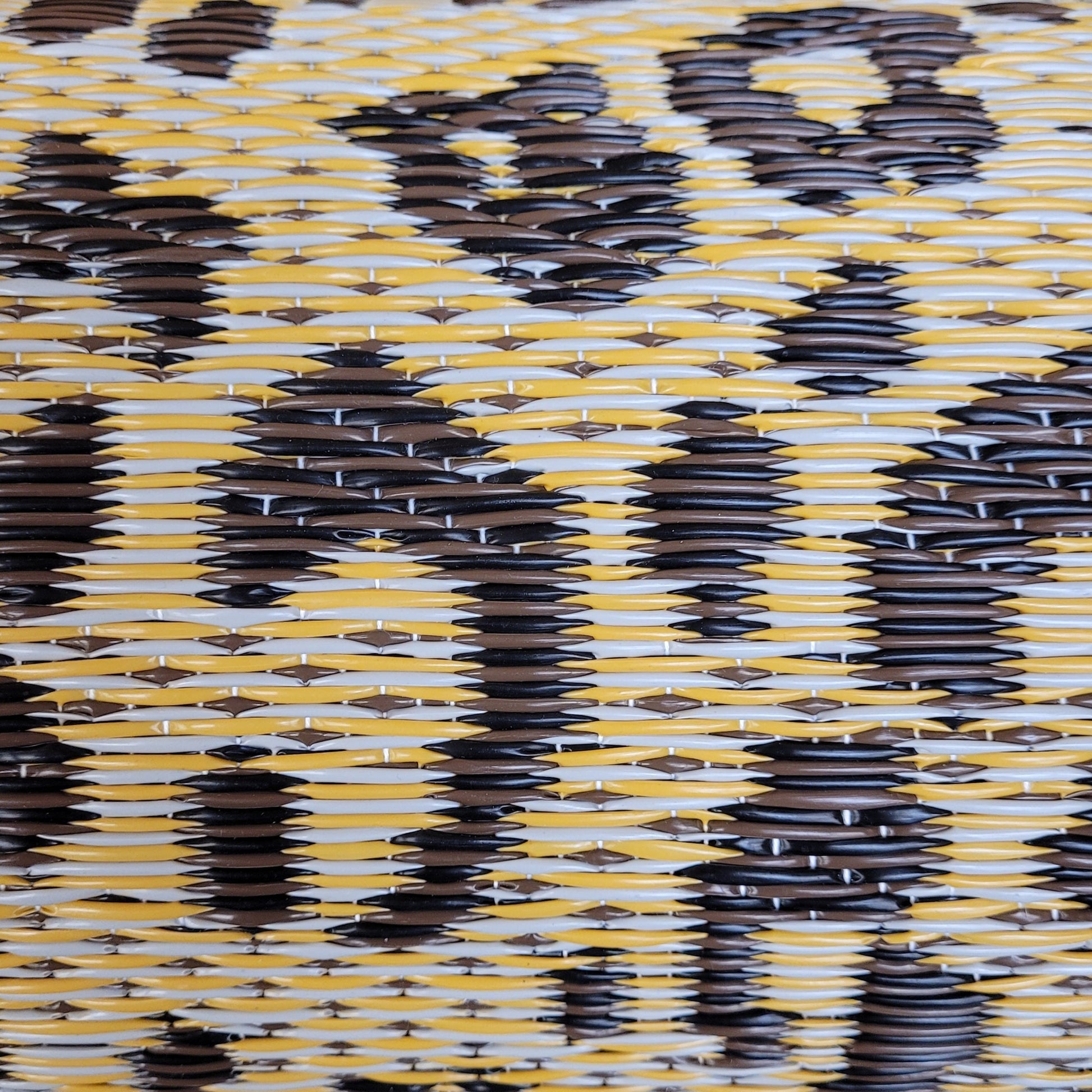 Patterned fabric with black, yellow, and gray colors